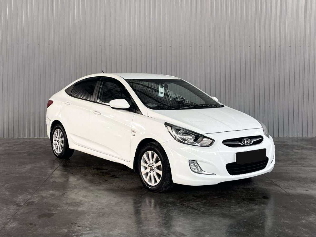 Hyundai Solaris с пробегом — 2013 год. Фото: #2