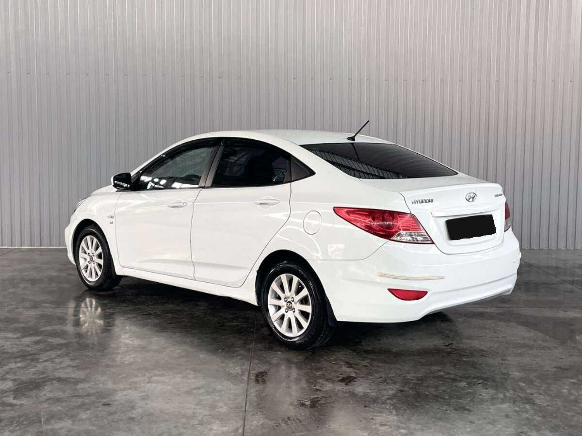 Hyundai Solaris с пробегом — 2013 год. Фото: #6