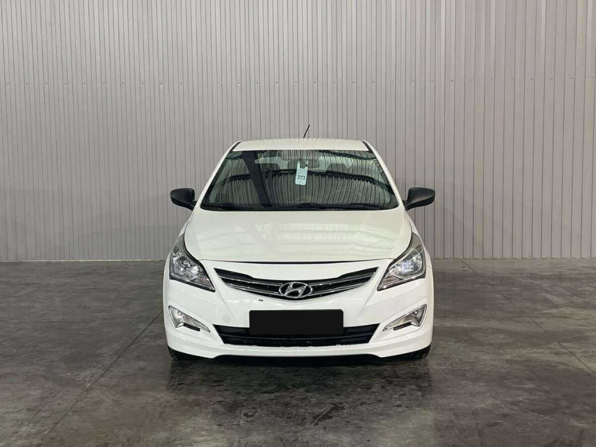 Hyundai Solaris с пробегом — 2014 год. Фото: #1
