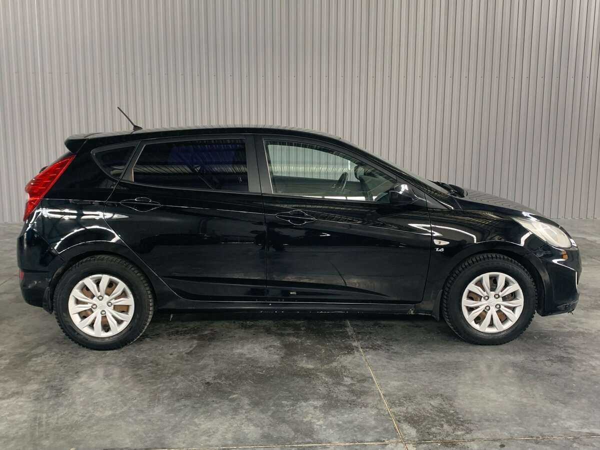 Hyundai Solaris с пробегом — 2012 год. Фото: #3