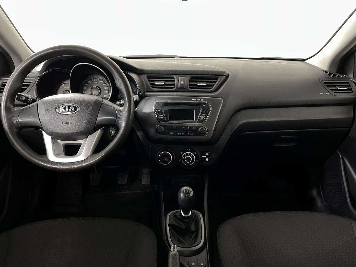 Kia Rio с пробегом — 2013 год. Фото: #6