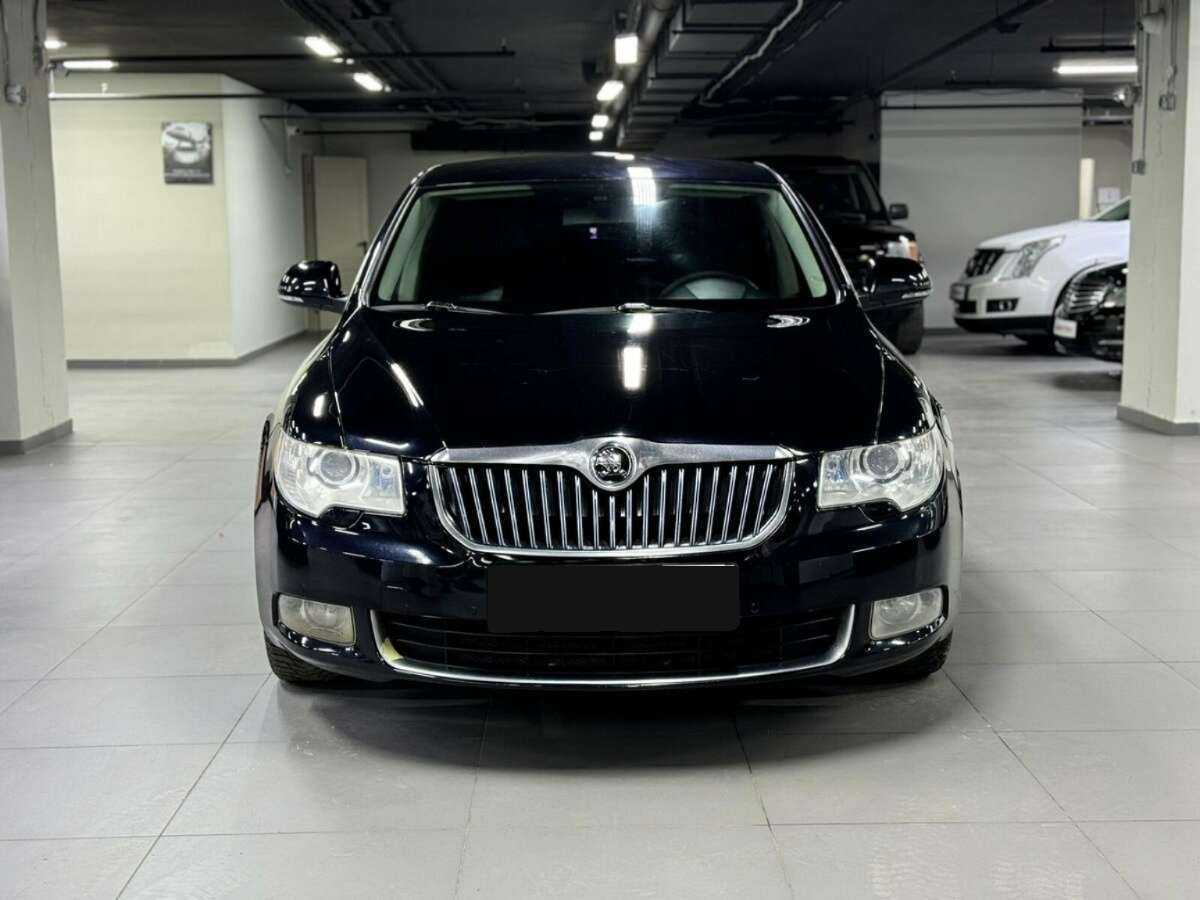 Skoda Superb с пробегом — 2013 год. Фото: #1