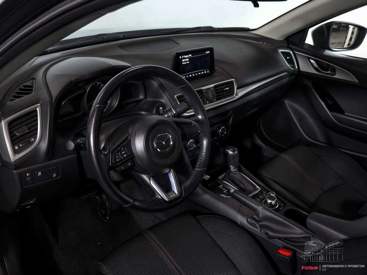 Mazda 3 с пробегом — 2017 год. Фото: #11