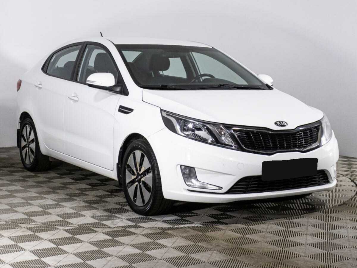 Kia Rio с пробегом — 2014 год. Фото: #2