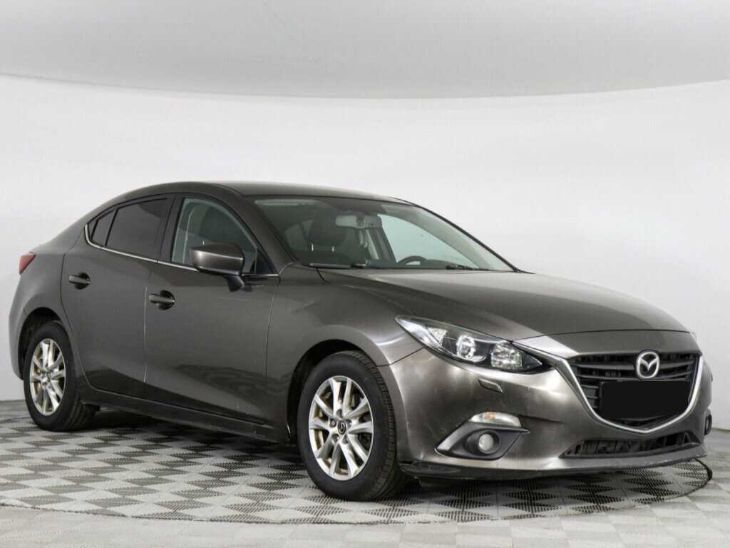 Mazda 3 с пробегом — 2014 год. Фото: #1
