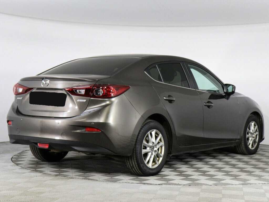 Mazda 3 с пробегом — 2014 год. Фото: #2