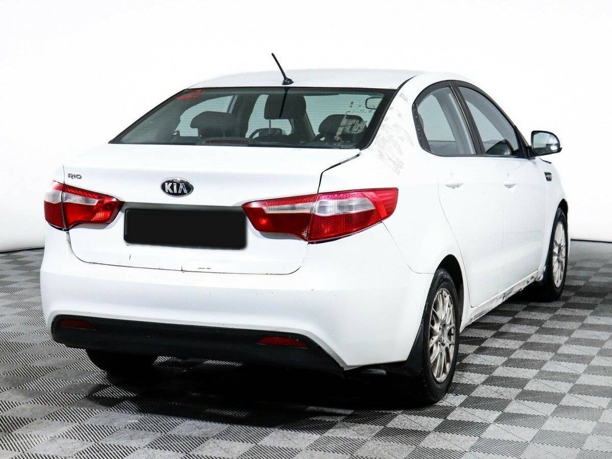 Kia Rio с пробегом — 2013 год. Фото: #3