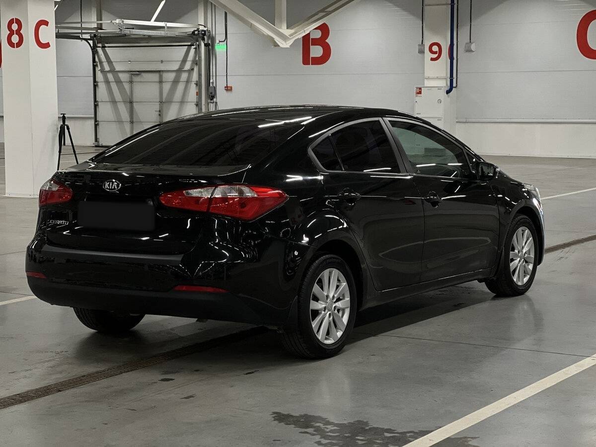 Kia Cerato с пробегом — 2014 год. Фото: #4