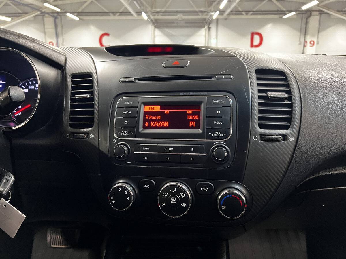 Kia Cerato с пробегом — 2014 год. Фото: #14