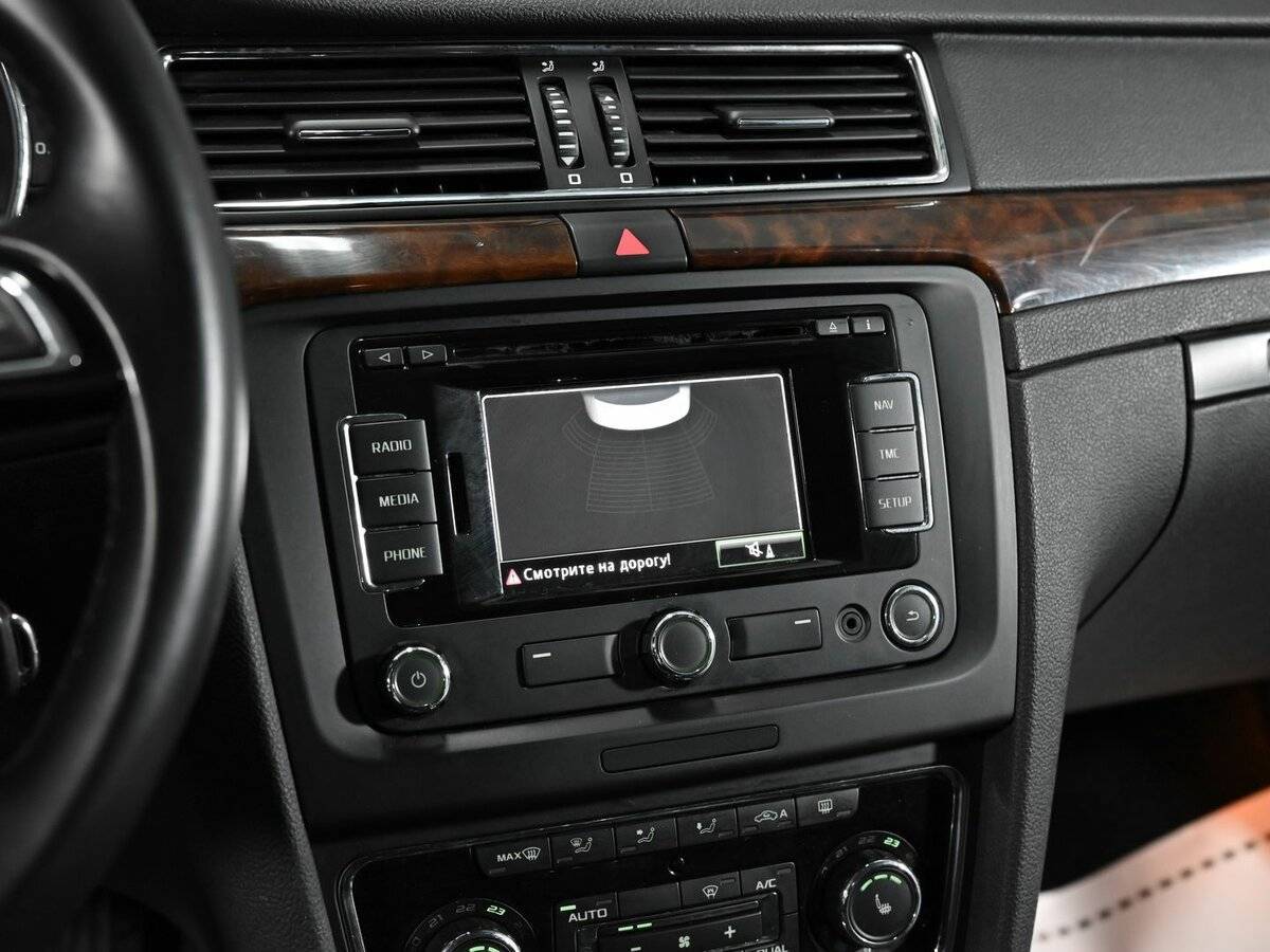 Skoda Superb с пробегом — 2013 год. Фото: #9