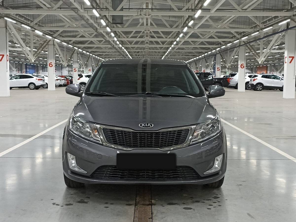 Kia Rio с пробегом — 2013 год. Фото: #1