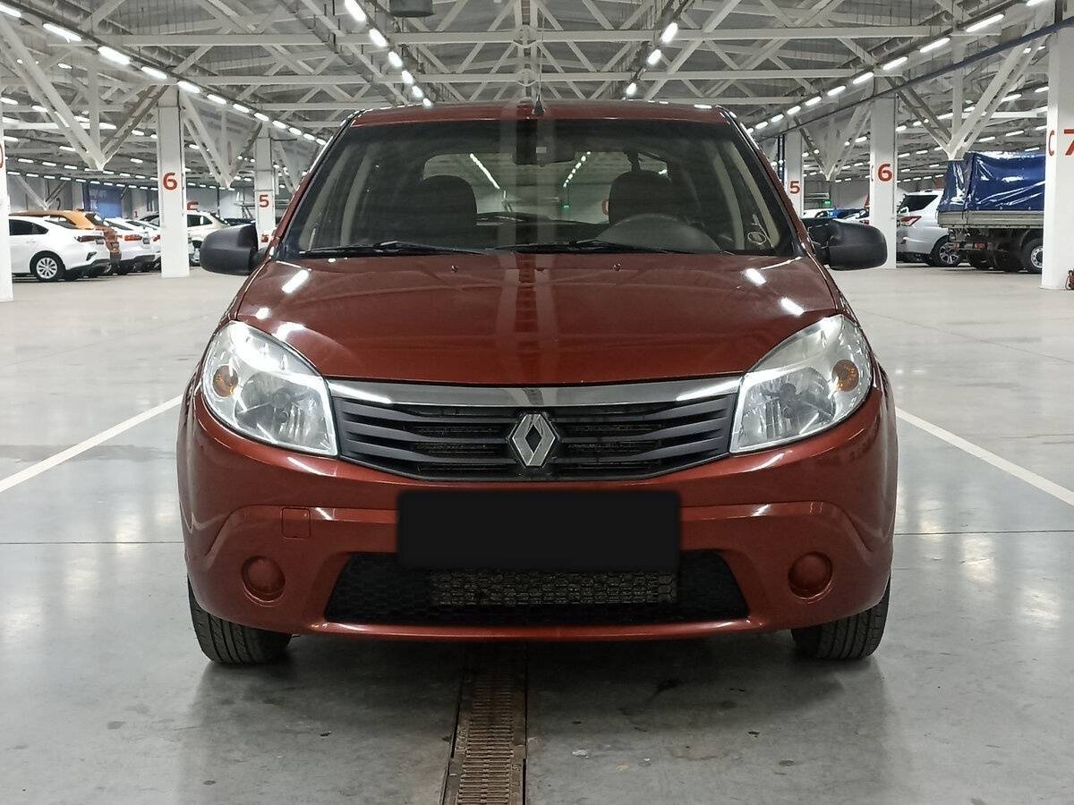 Renault Sandero с пробегом — 2013 год. Фото: #1