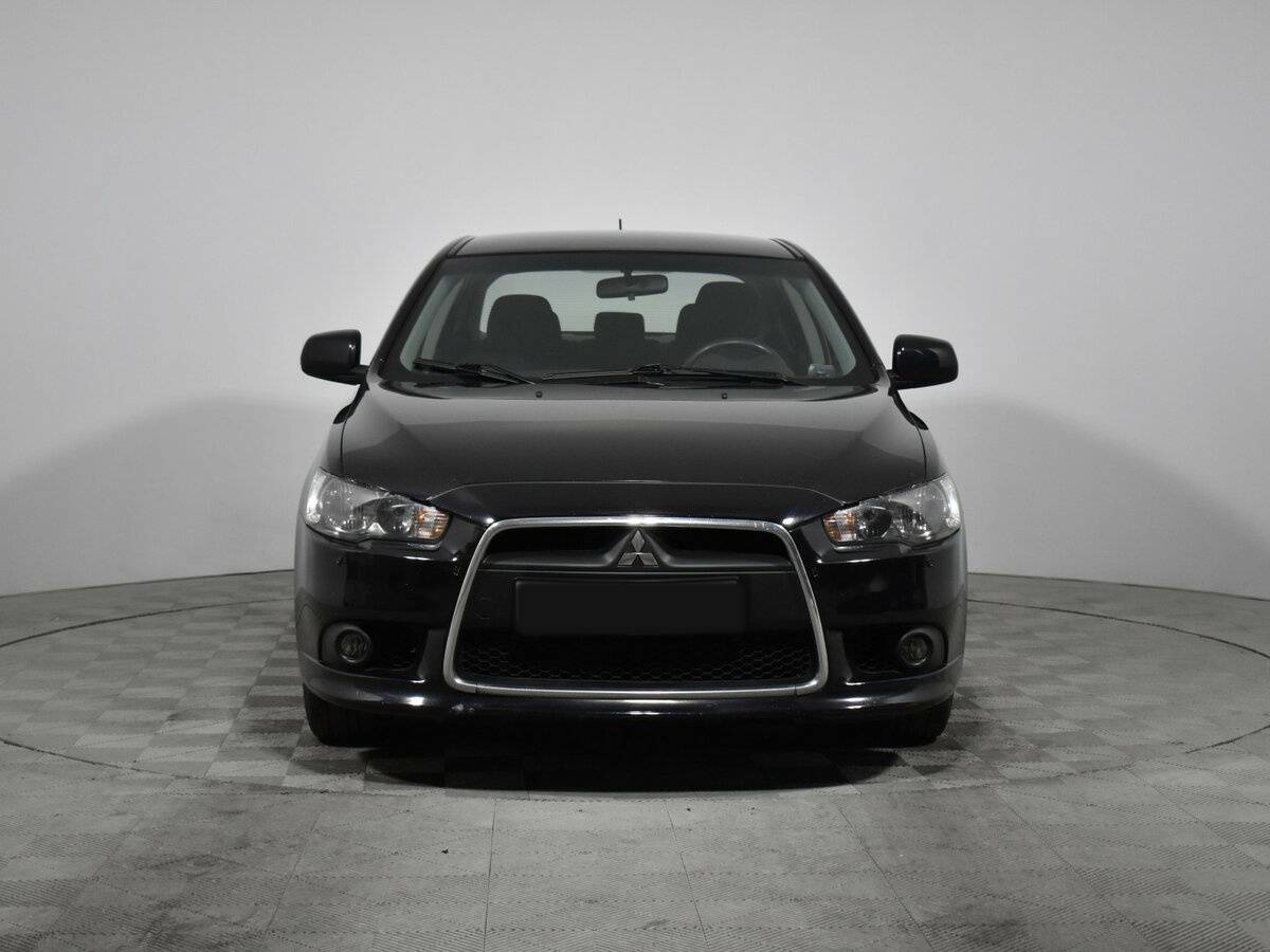 Mitsubishi Lancer с пробегом — 2012 год. Фото: #1