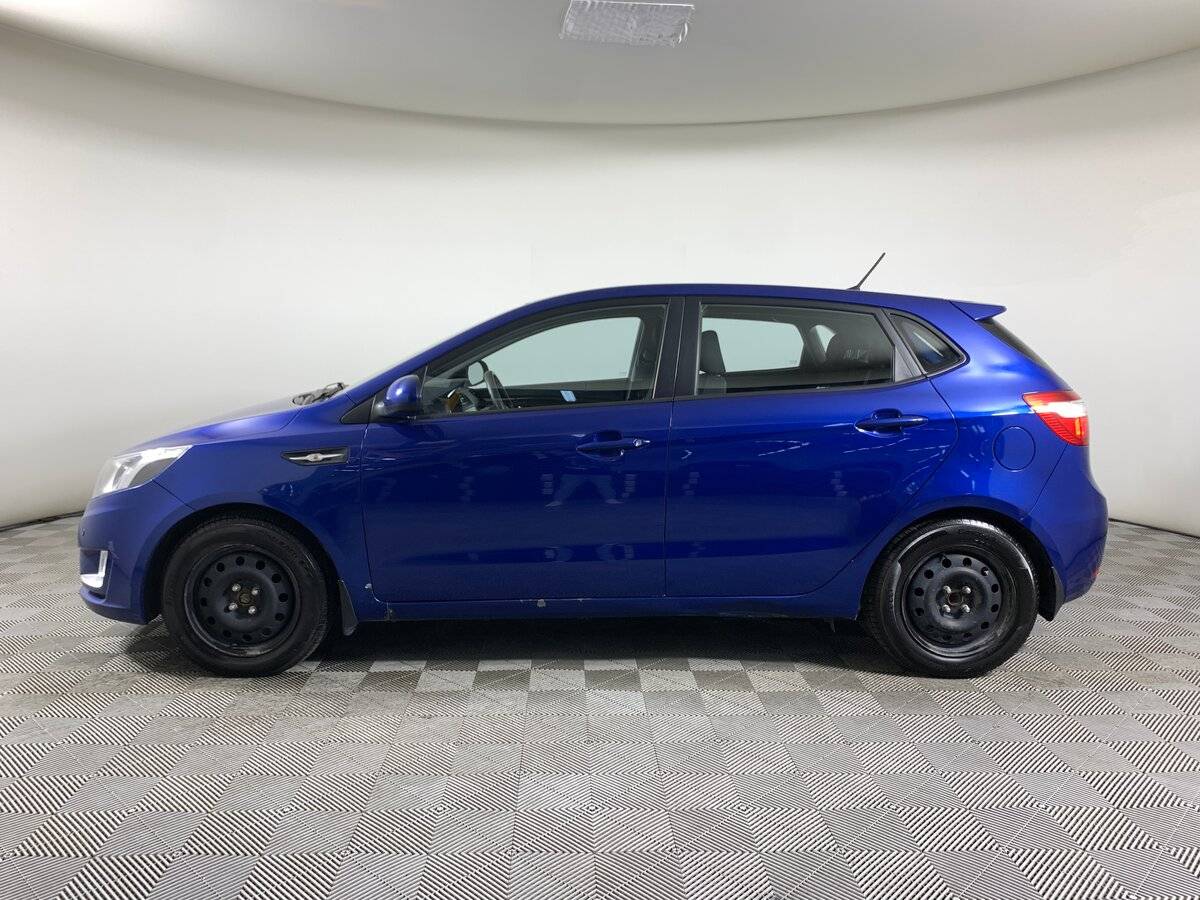 Kia Rio с пробегом — 2013 год. Фото: #7
