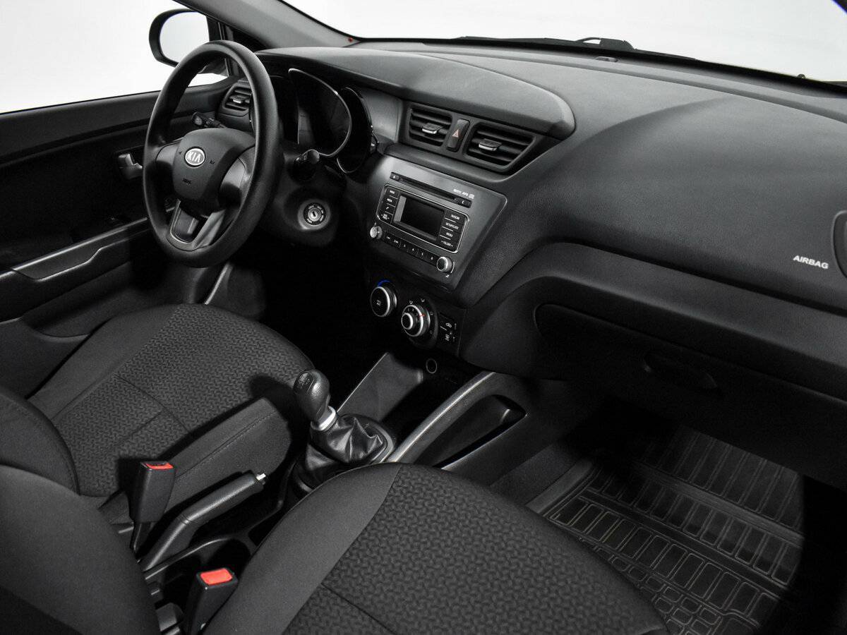 Kia Rio с пробегом — 2012 год. Фото: #11