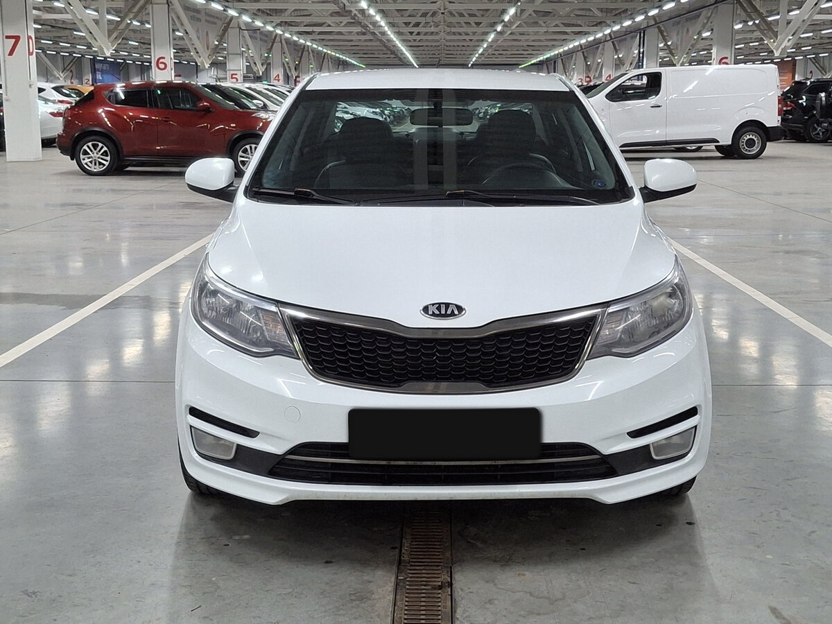 Kia Rio с пробегом — 2015 год. Фото: #1
