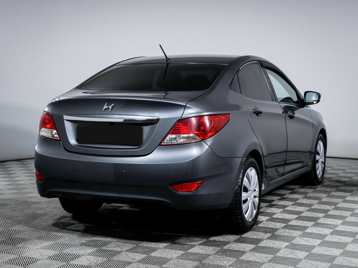 Hyundai Solaris с пробегом — 2012 год. Фото: #3