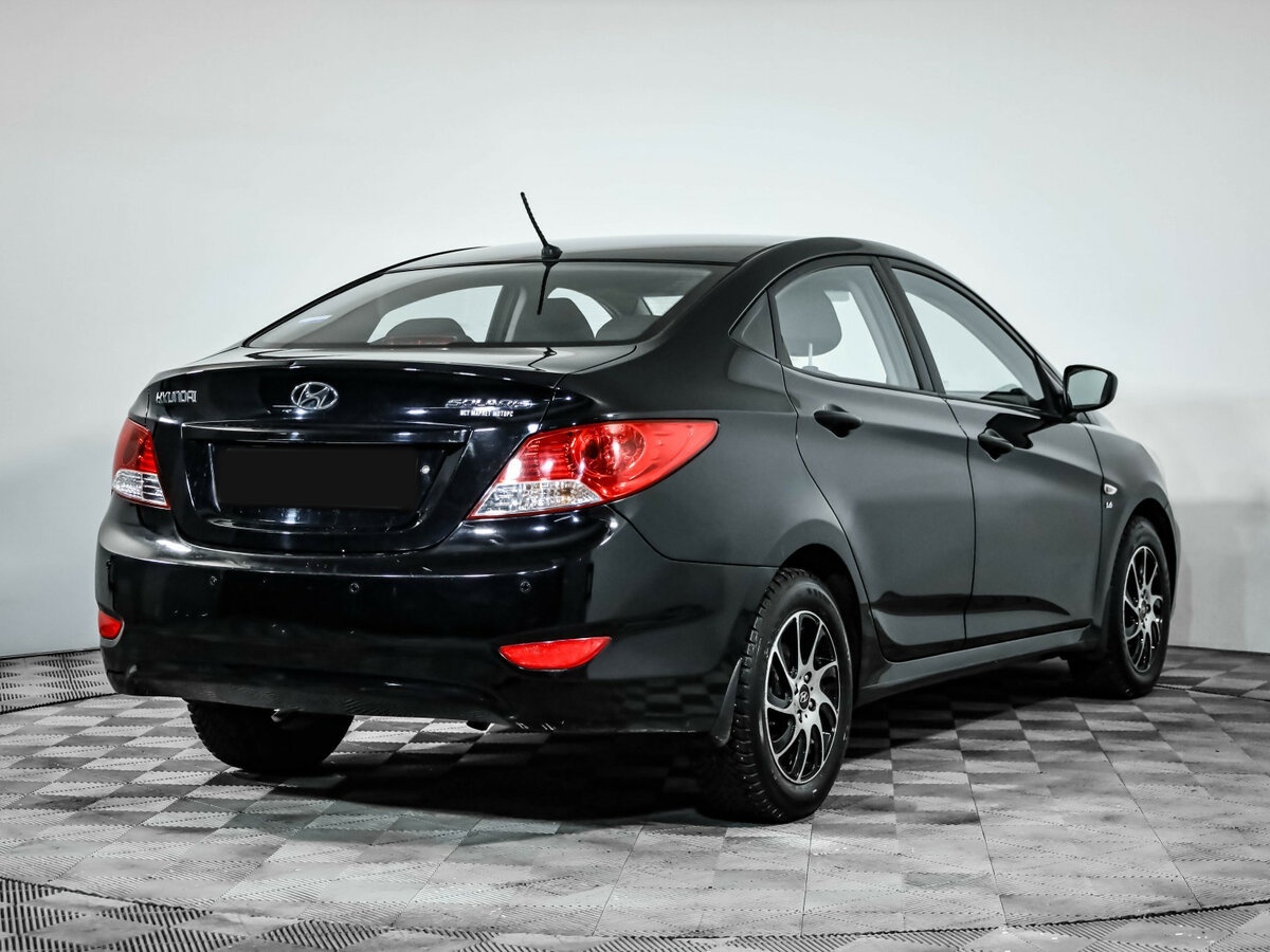 Hyundai Solaris с пробегом — 2013 год. Фото: #4