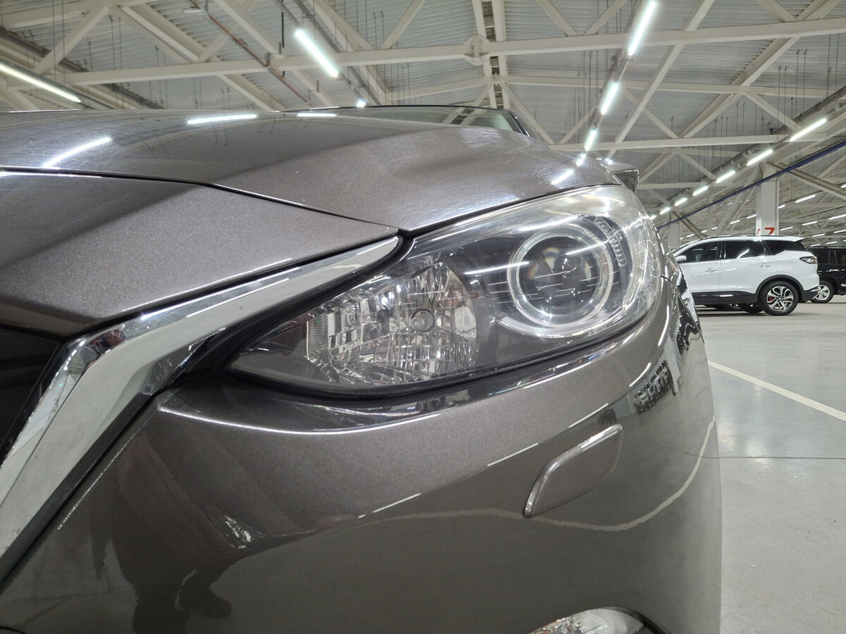 Mazda 3 с пробегом — 2014 год. Фото: #16