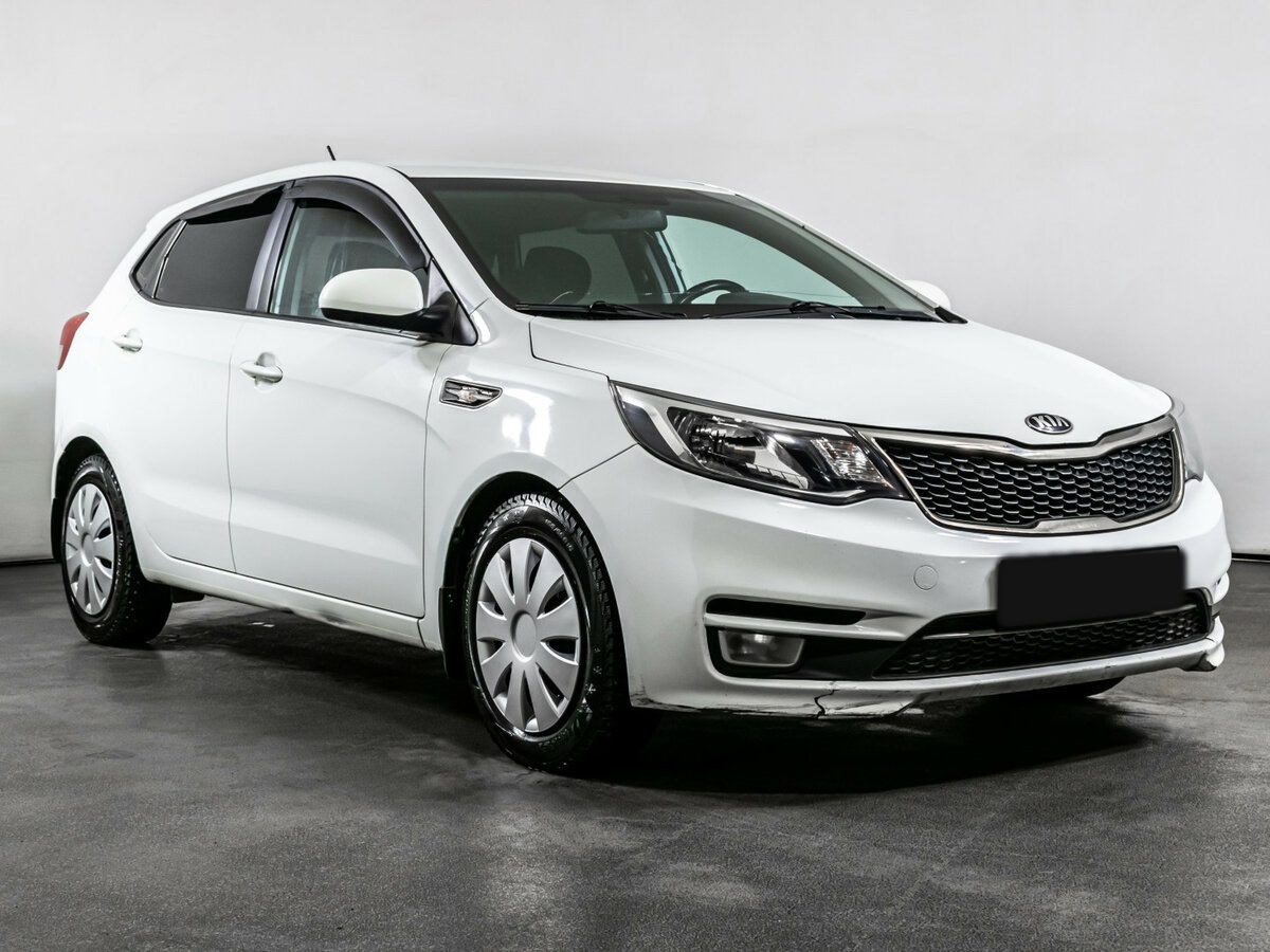 Kia Rio с пробегом — 2015 год. Фото: #2