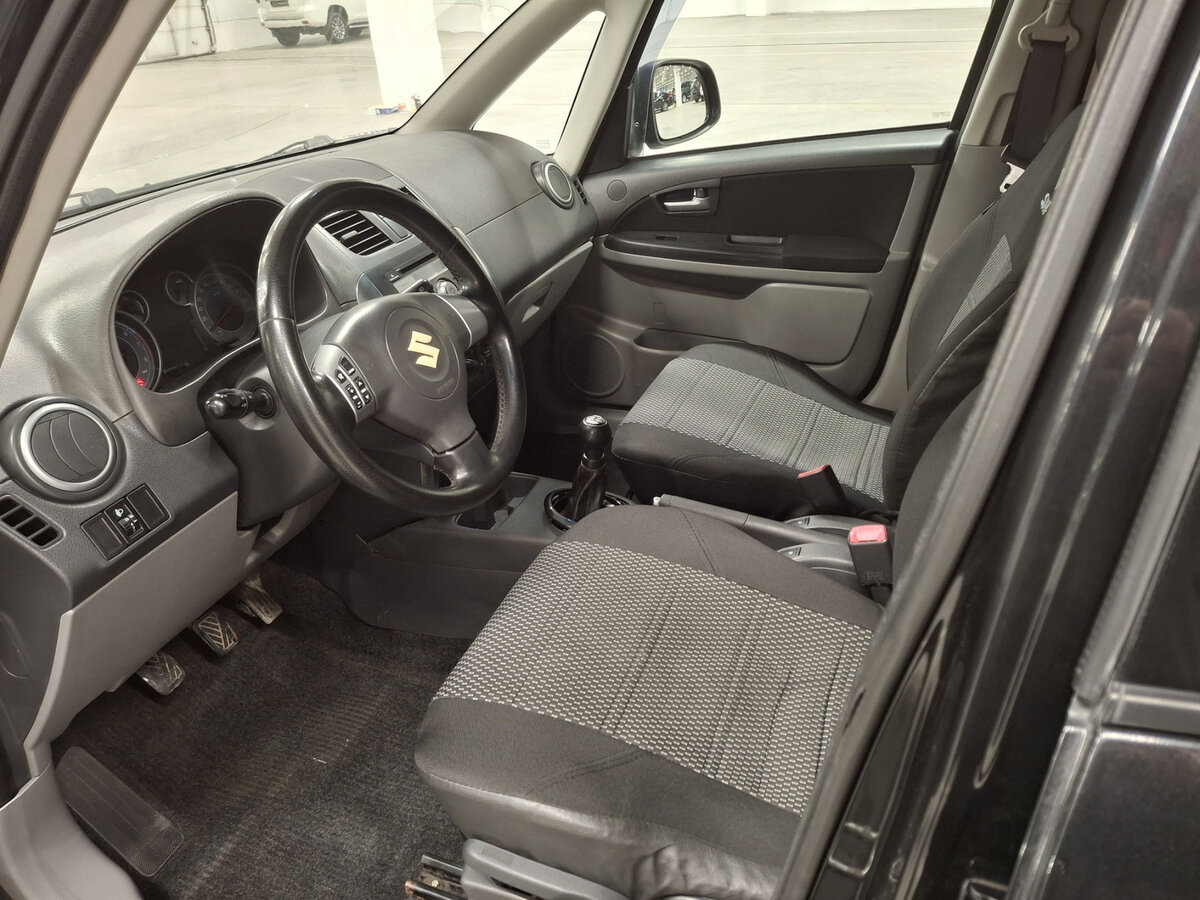 Suzuki SX4 с пробегом — 2012 год. Фото: #15